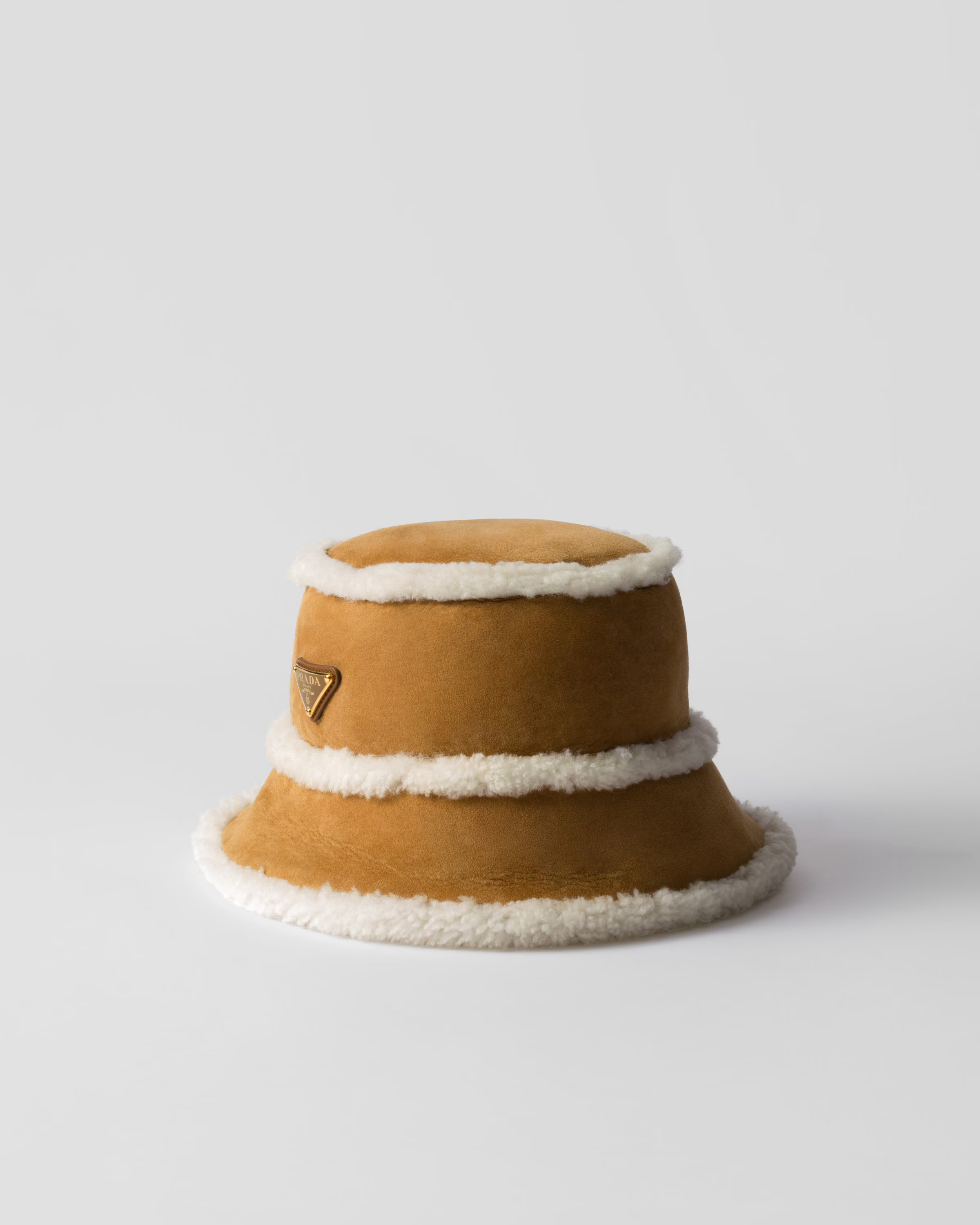 Suede shearling bucket hat | Prada US