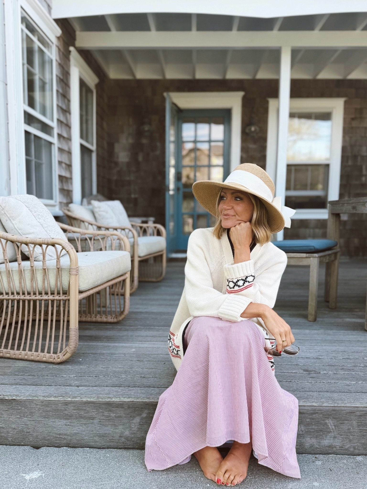 Xs in sweater and dress 
The BEST packable hat
