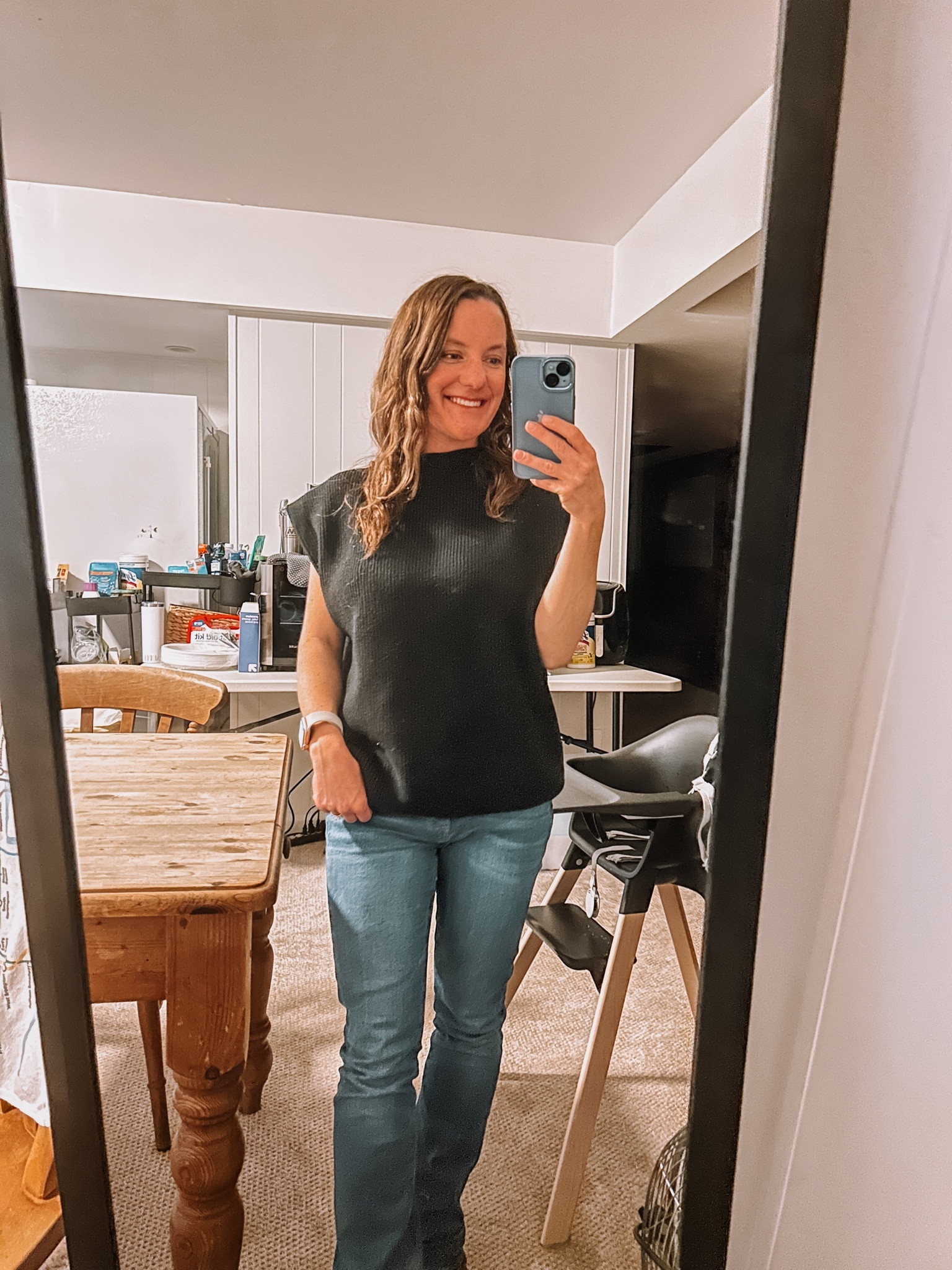 Work OOTD today 
Black sweater tank 
Flare jeans 
Tan boots 

Felt cute! Will wear again. 

It’s the perfect transition to Spring look 

#LTKstyletip #LTKworkwear #LTKSeasonal