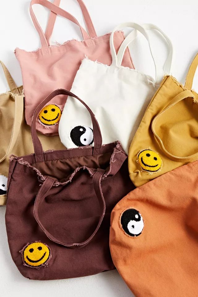 UO Smile Patch Distressed Canvas Tote Bag | Urban Outfitters (US and RoW)