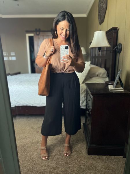 Black and tan is one of my favorite combos year round! This easy teacher workwear look is comfortable and affordable! Wearing a small in my wide leg gaucho pants and I sized up for an oversized fit to a medium in my $6 v neck cotton tee.

#LTKBacktoSchool #LTKworkwear #LTKover40