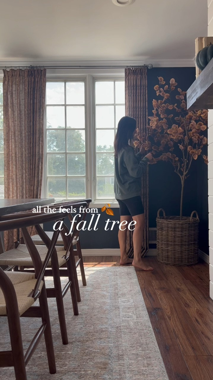 this corner is perfect for a statement piece— I change it up seasonally and absolutely adore when I put out this fall eucalyptus tree. the autumn colors are perfect and pop against our moody walls 🤎 
#Falldecor #homedecor #diningroom 

#LTKSeasonal #LTKFallSale #LTKHome