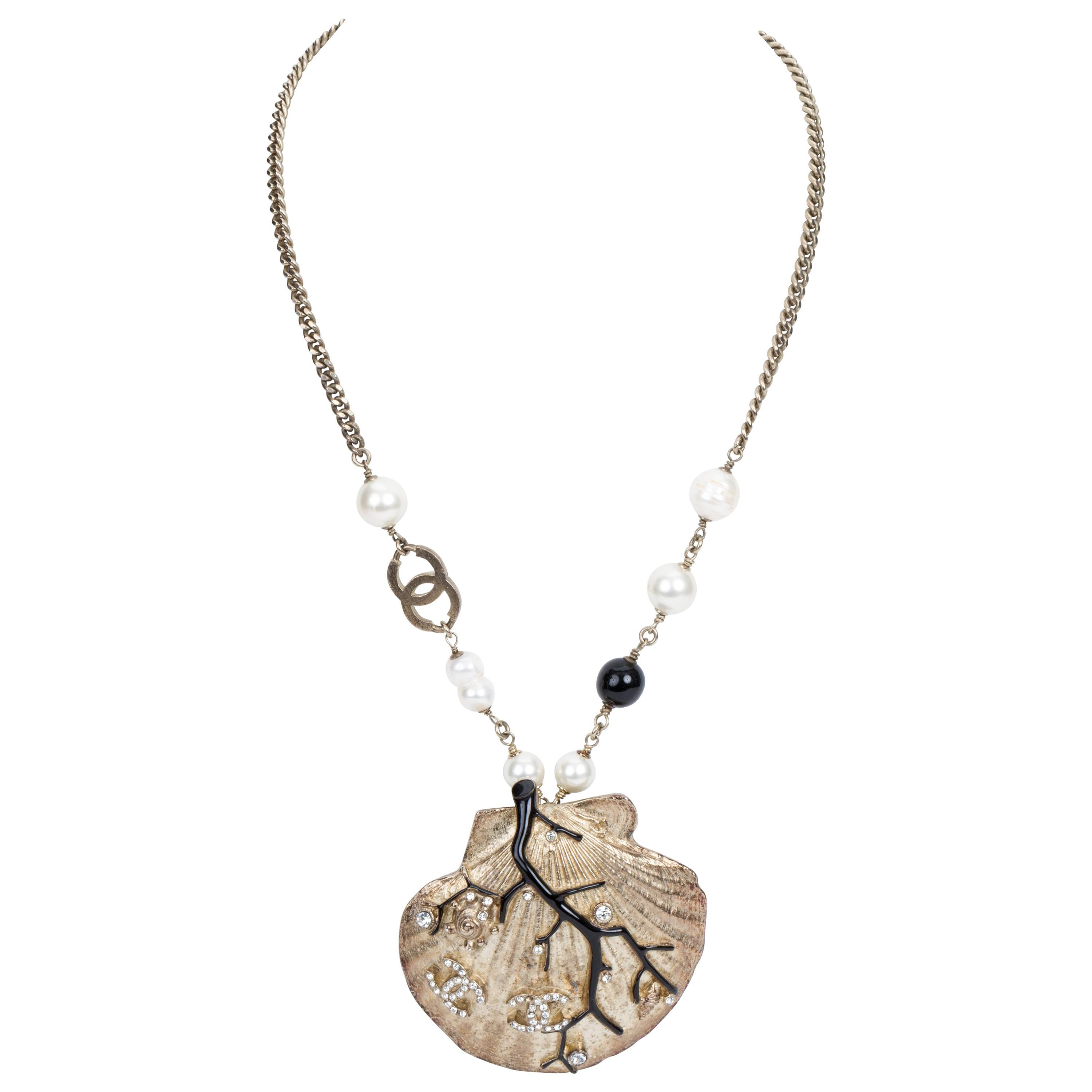 Chanel Shell & Coral CC Logo Necklace | 1stDibs