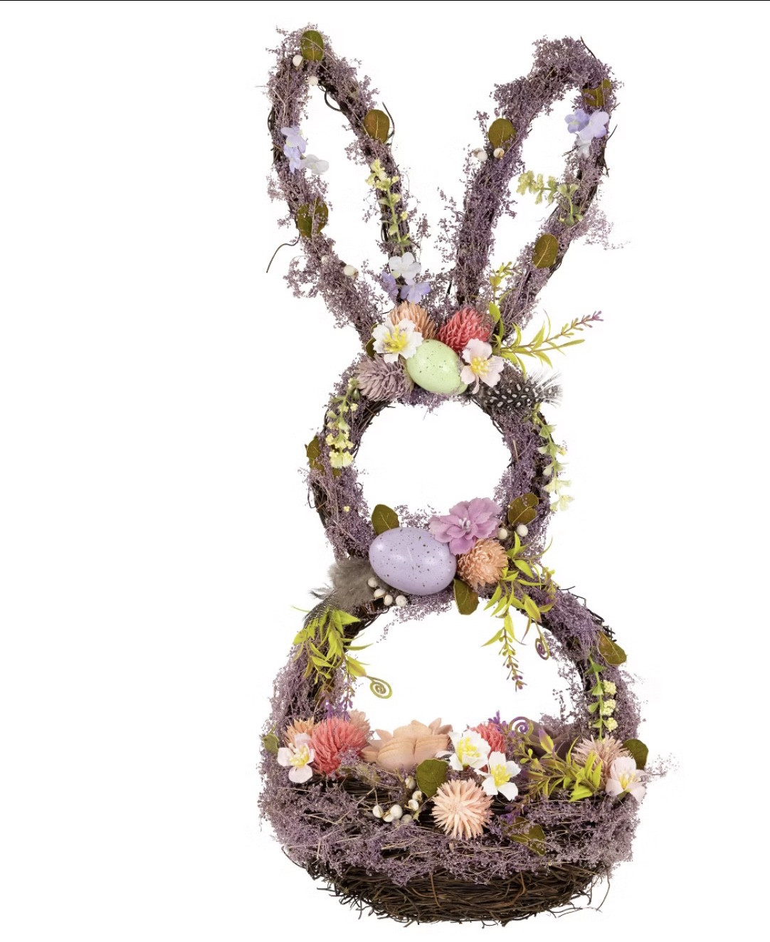 Rabbit-Shaped Floral Easter Basket Decoration
Decorated With Flowers; Mixed Greenery And Feathers
Accented With Speckled Eggs And Globe Thistles
Recommended For Indoor Use Only
Measures 21 Inches High By 9 Inches Wide By 6.5 Inches Deep
Description
This adorable bunny-shaped basket is crafted from grapevine and is filled with vibrant Easter inspired greenery and pastel-colored eggs. The purple hue adds a pop of color to your home while the intricate design and details make it a truly eye-catching piece. Hang this basket on your front door or use it as a centerpiece on your Easter table to create a whimsical and festive atmosphere. Whether you're celebrating Easter or simply embracing the arrival of spring, this bunny-shaped basket is a delightful addition to your home decor. Product Features: Bunny-shaped grapevine Easter basket Crafted from grapevine and mixed greenery Embellished with pastel green, pink, purple and white speckled eggs Wooden flowers, preserved leaves and globe thistle accents Weighed bottom for stability For indoor use only Dimensions: 21"H x 9"W x 6.5"D Material(s): grapevine/plastic/fabric/foam/preserved greenery@Target 

#LTKKids #LTKFestival #LTKSaleAlert