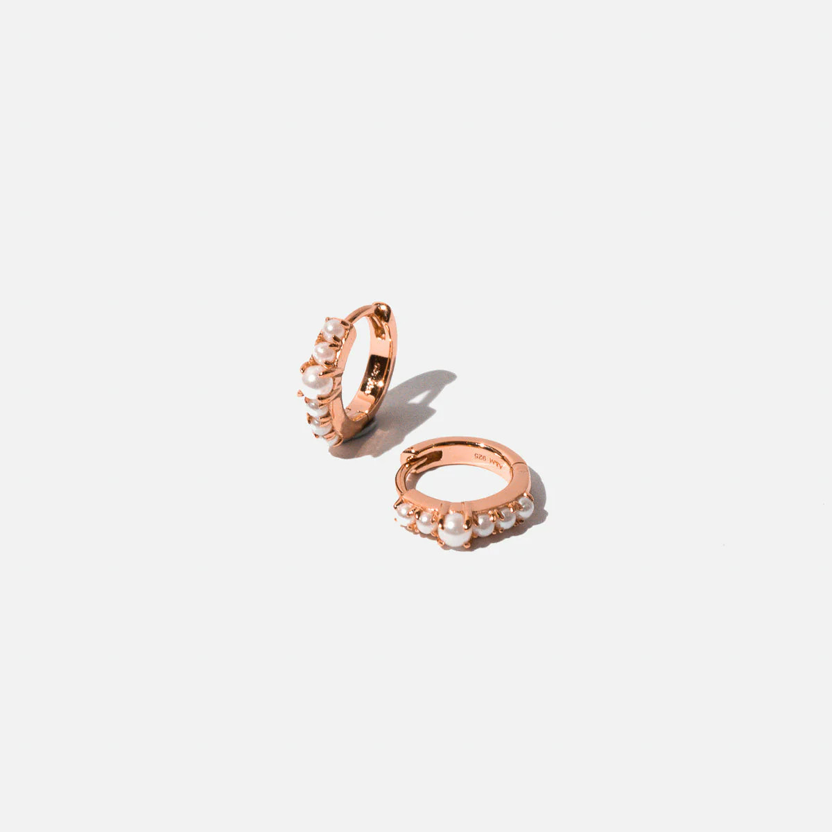 Radiant Rose Gold Pearl Huggies | Astrid & Miyu Earrings | Astrid & Miyu US