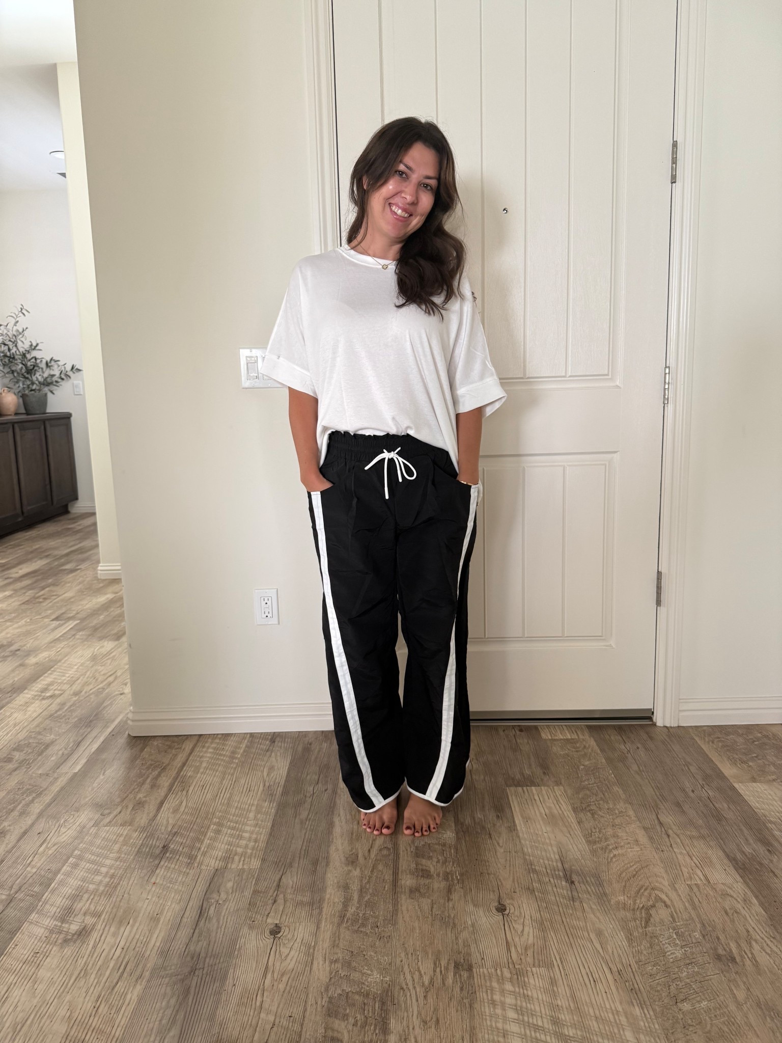 Comfy pants of the day. These are windbreaker material and the shirt is one of my new favorite basics for fall! 

#LTKPetite #LTKFindsUnder100 #LTKActive