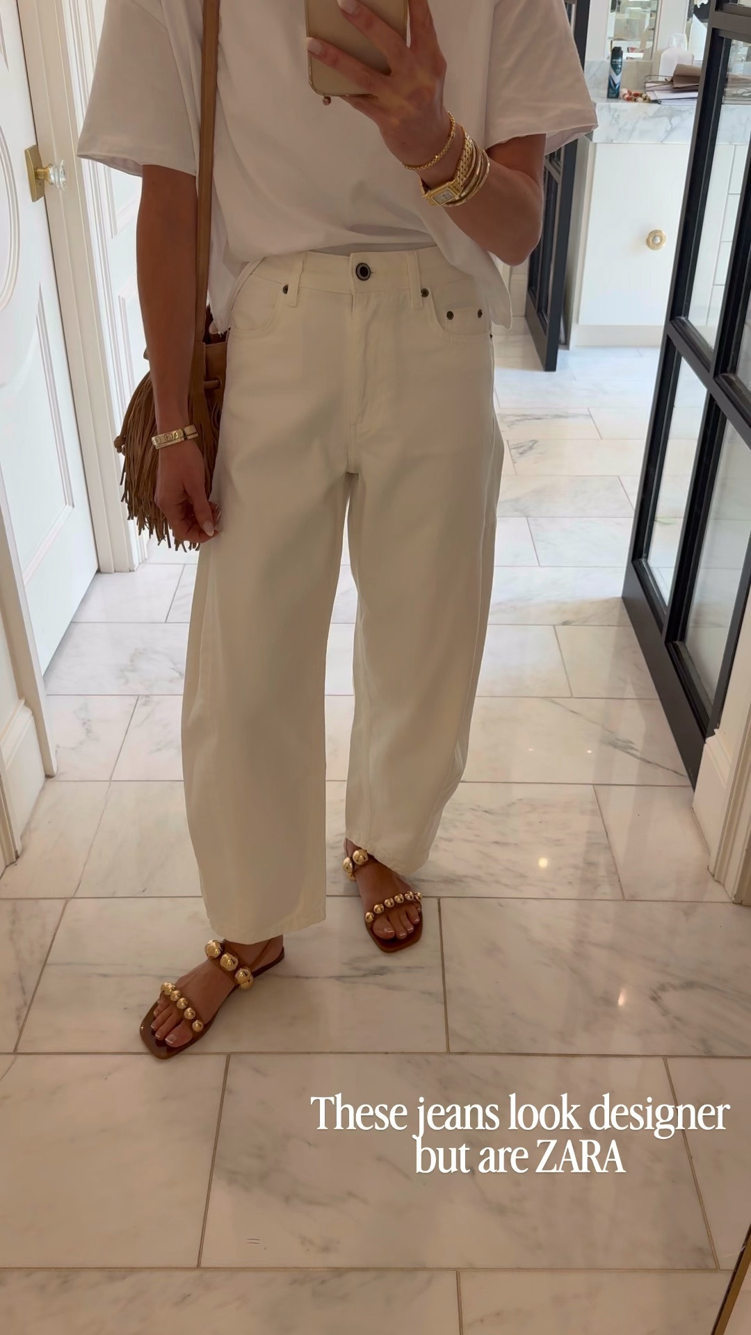Outfit of the day is white on white with some cute brown accessories! My shirt is 23% off on Amazon and my @Zara balloon jeans are under $80 🤍

Wearing size 2 in jeans 
Small in top

#LTKjeans #LTKstyletip