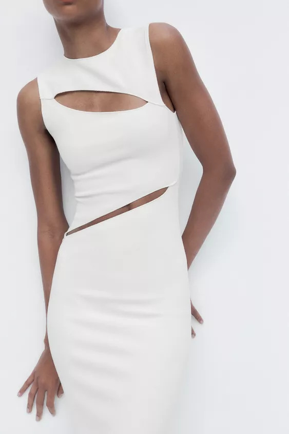 Knit midi dress. Round neck and sleeveless. Cutout detail at front. | Zara US