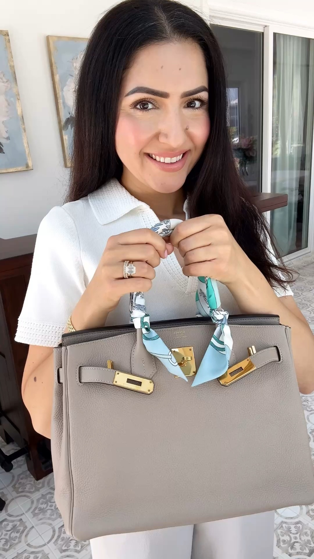 Proof that you can be comfortable and still look put together. 🤍 Loving this effortless combo of a beautiful white top and comfy pants. Simple, chic, and easy to wear all day. 

Macys white top. Aritzia pants. Everything runs true to size. Hermes Birkin bag. Hermes oran sandals.