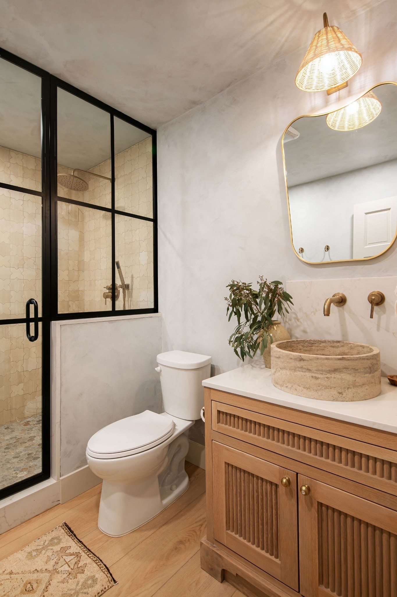 Excited to share this powder bath design with you! Can’t link everything.. but can share some of the deets and products! 

We used a lime wash on the walls by Portola Paints and then designed a custom oak vanity with a Rubio Monocot stain and a custom made black iron and glass shower door… Here are the links for the sink, mirror, light fixture, plumbing fixtures and floor mat! 

#LTKFamily #LTKOver40 #LTKHome