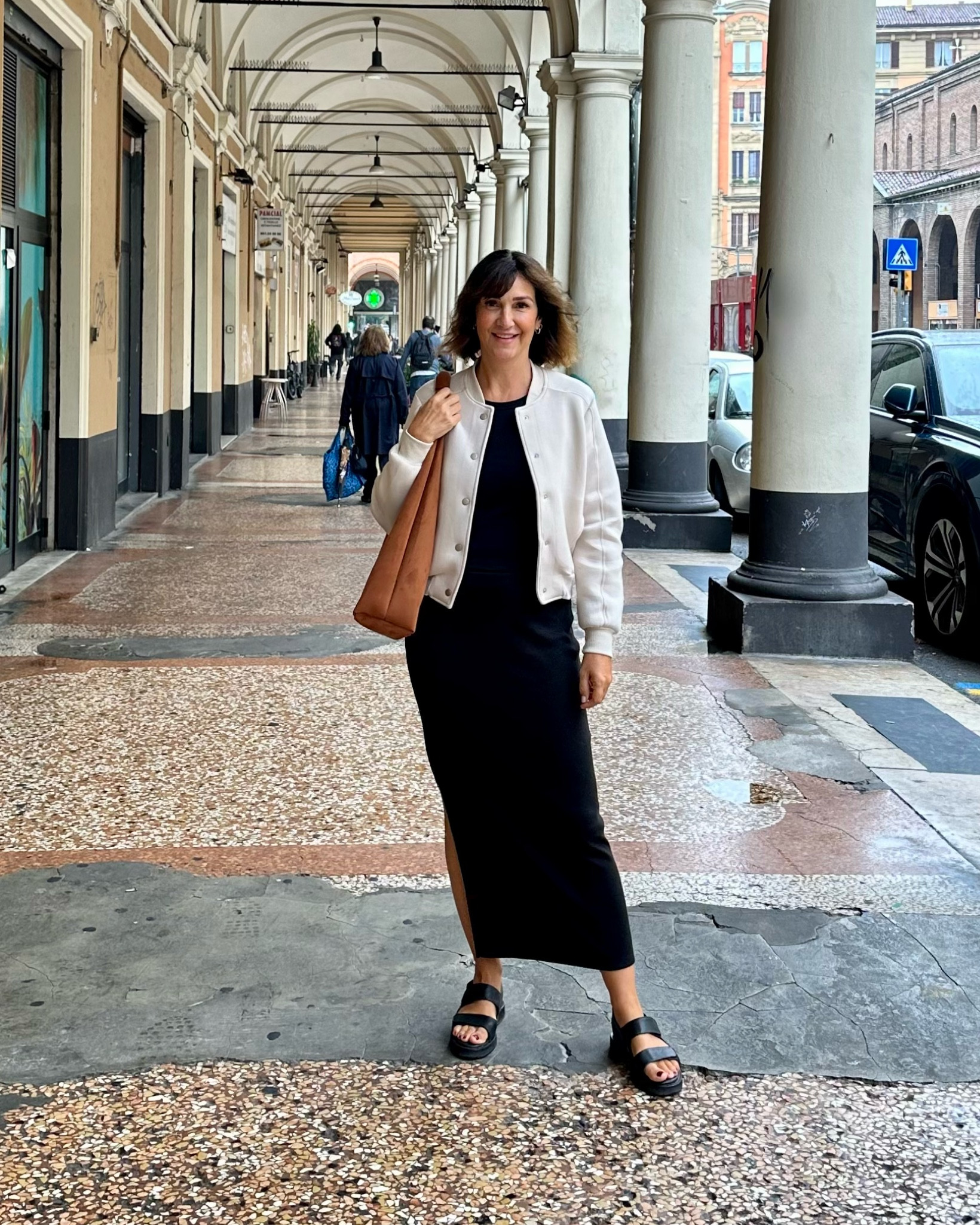 Shopping in Bologna! Was chilly and rainy but warmed up in the afternoon and I removed the jacket. I’m 5’ 7” size 4ish wearing:
- XS in the bomber jacket, small for me too but was more of an oversized fit, the material is super soft and stretchy, easy to fold up or wear around your waist or shoulders
- m in the tank, small for me too but the built in bra band was more comfortable on the M. I have these tanks in tons of colors, they are a great basic
- sandals are pricy but great quality and so comfortable, they fit tts and the straps are adjustable with Velcro
- bag is from last year and available this year in different colors
- skirt is old, it’s just a basic knit stretchy skirt, very versatile 


#LTKStyleTip #LTKTravel #LTKShoeCrush
