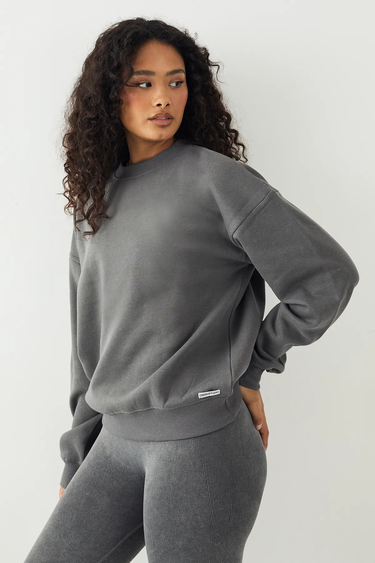 Charcoal DSGN Studio Crew Neck Oversized Sweatshirt | PrettyLittleThing USA | PrettyLittleThing US