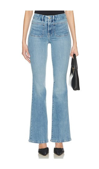 Good American Good Legs Flare Jeans in Denim-Light. - size 22 | Revolve Clothing (Global)