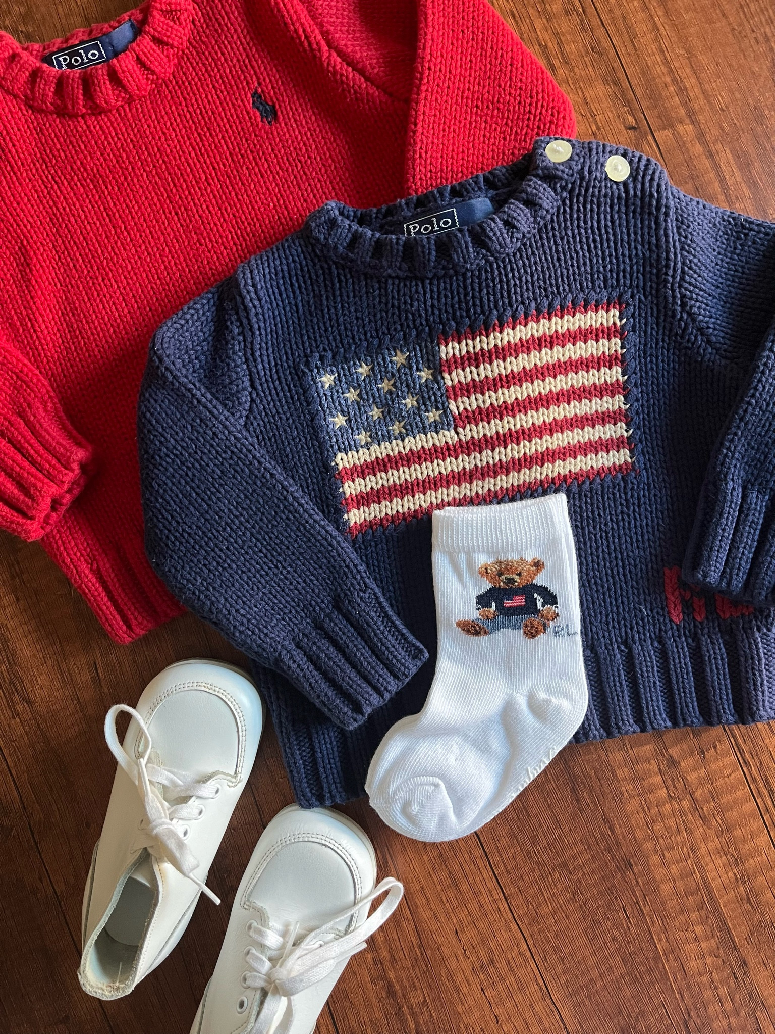 🧸 Linked below! ⬇️ There’s something about these Ralph Lauren Baby knits that are so precious, and never go out of style! Featured here is a vintage red Ralph Lauren baby sweater and the iconic Ralph Lauren baby American flag sweater. Paired with teddy bear socks 🧸❤️ how cute?!! 💙 

#LTKFamily #LTKBaby #LTKBump