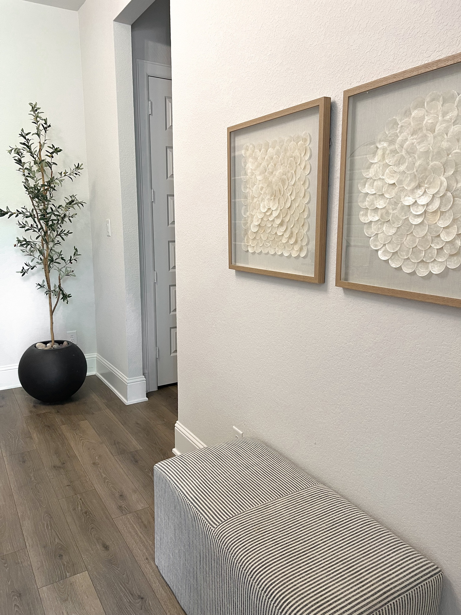 Target bench. Beautiful artwork. Olive tree, rocks and planter. Enterway. Home  

#LTKunder100 #LTKsalealert #LTKhome