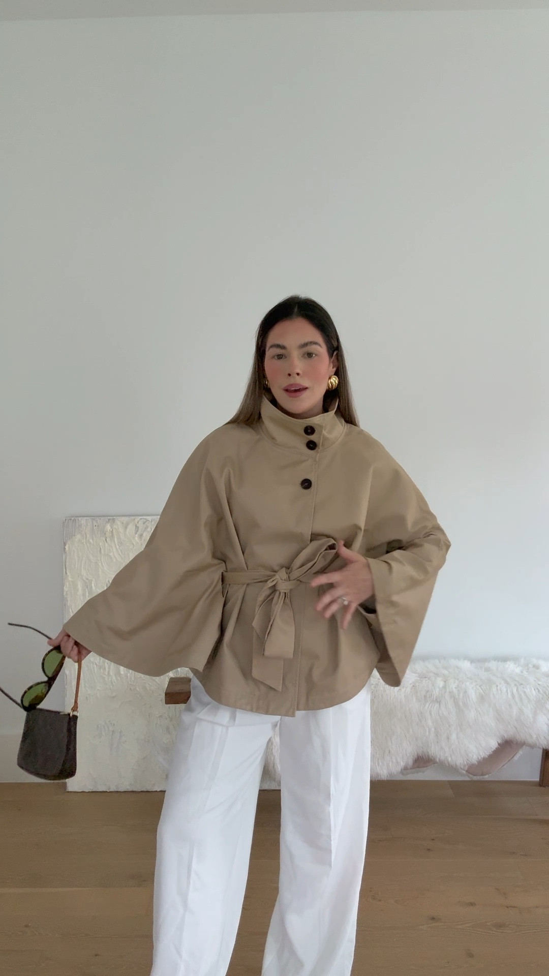 Cape trench coat