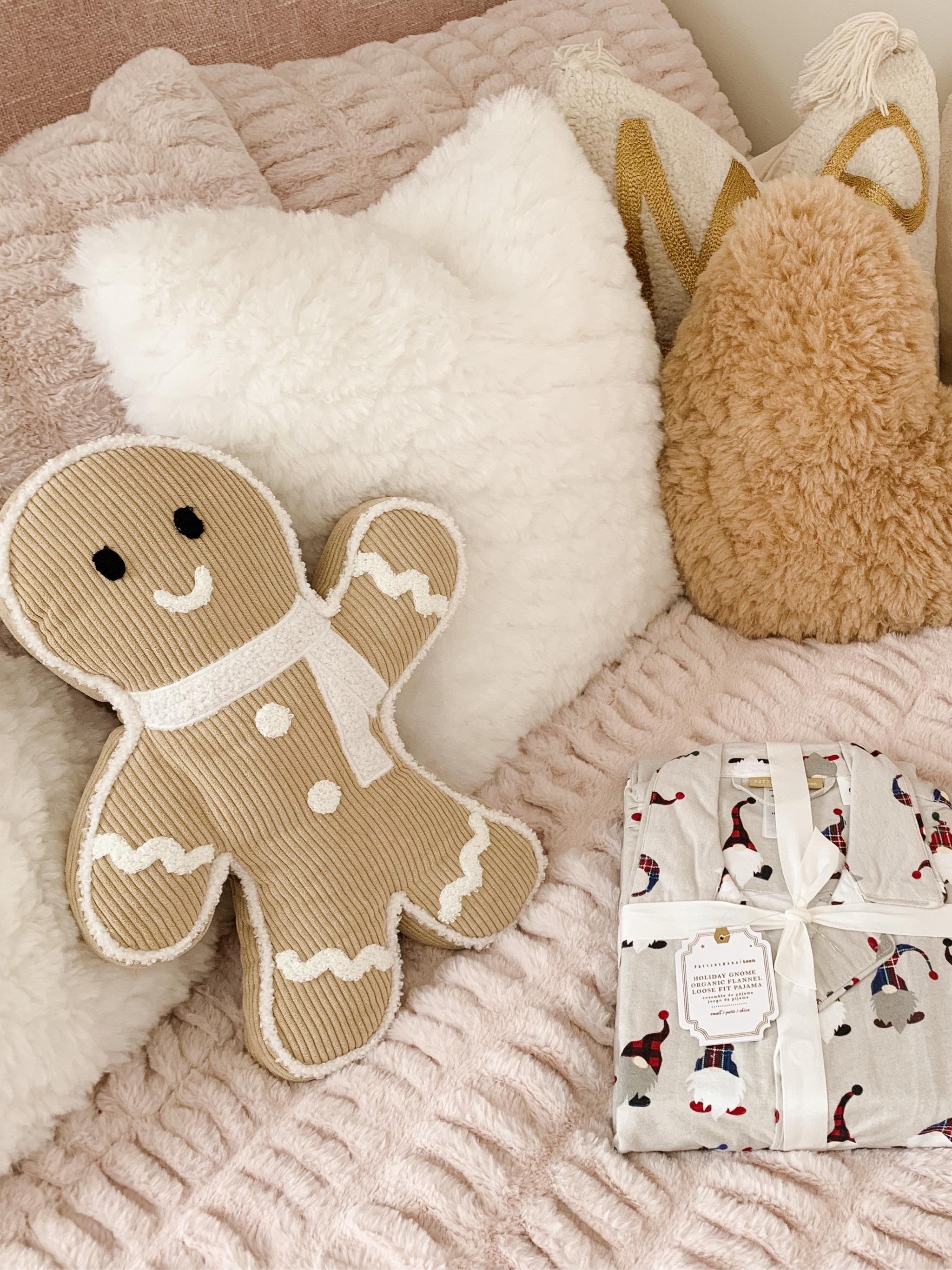 Teen girl room cozied out for Christmas. Pottery Barn Teen bedding, pajamas, and gingerbread pillows.

#LTKSeasonal #LTKkids #LTKHoliday