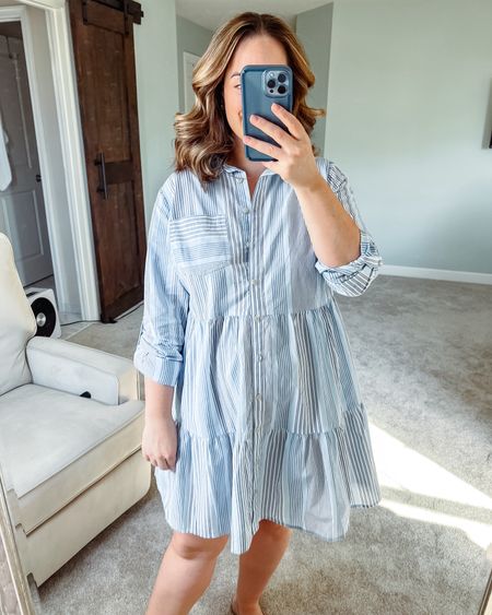 Blue and white striped shirt dress for spring! I’m wearing a size large. I’m 5’4” and it hits right at the knee on me. I love the tiered design and flowiness. 

bump friendly, grandmillennial coastal grandmother coastal classic preppy casual fashion mom style petite style, Pinterest style, style over 30, capsule wardrobe, mom style, outfit idea, outfit inspo, neutral outfit, size medium, size 8, size 10, petite fashion, petite style, fall trends, outfit inspo, shopping haul, midsize, spring outfit, spring style, postpartum, Easter dress, baby shower dress, spring break, vacation dress


#LTKmidsize #LTKtravel #LTKSeasonal
