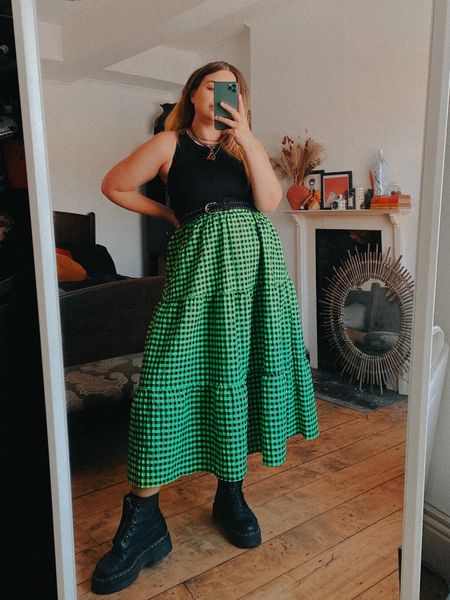 Alternative pregnancy style/outfits. Neon green check skirt, cropped black top, dr marten boots. 

#LTKunder50 #LTKbump
