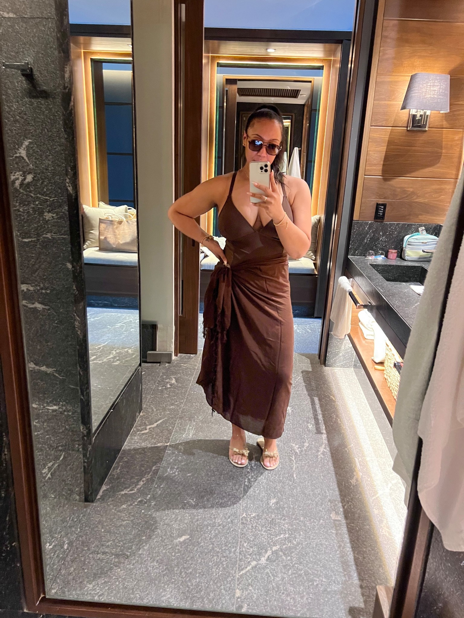 Loved this super family friendly and modest swimmie! The back is criss-crossed with great coverage and the coverup can be worn many ways! I have it around my waist but wore it tied around my neck a lot too! Wearing a Large in the swimmie and it runs TTS.

#LTKSwim #LTKTravel