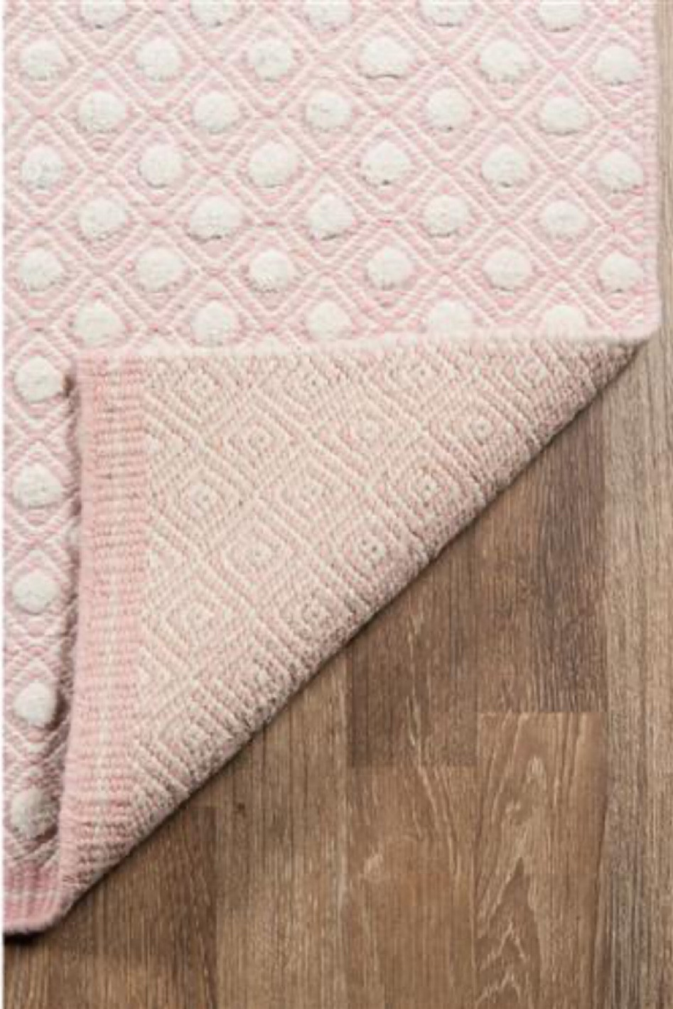 Our nursery rug! 🩷 

Kathy Kuo. Nursery rug. Pink rug. Wool. Diamond Dot Patterned Rug. Baby room. Baby girl nursery. Girl bedroom. Textured rug. 

#LTKhome