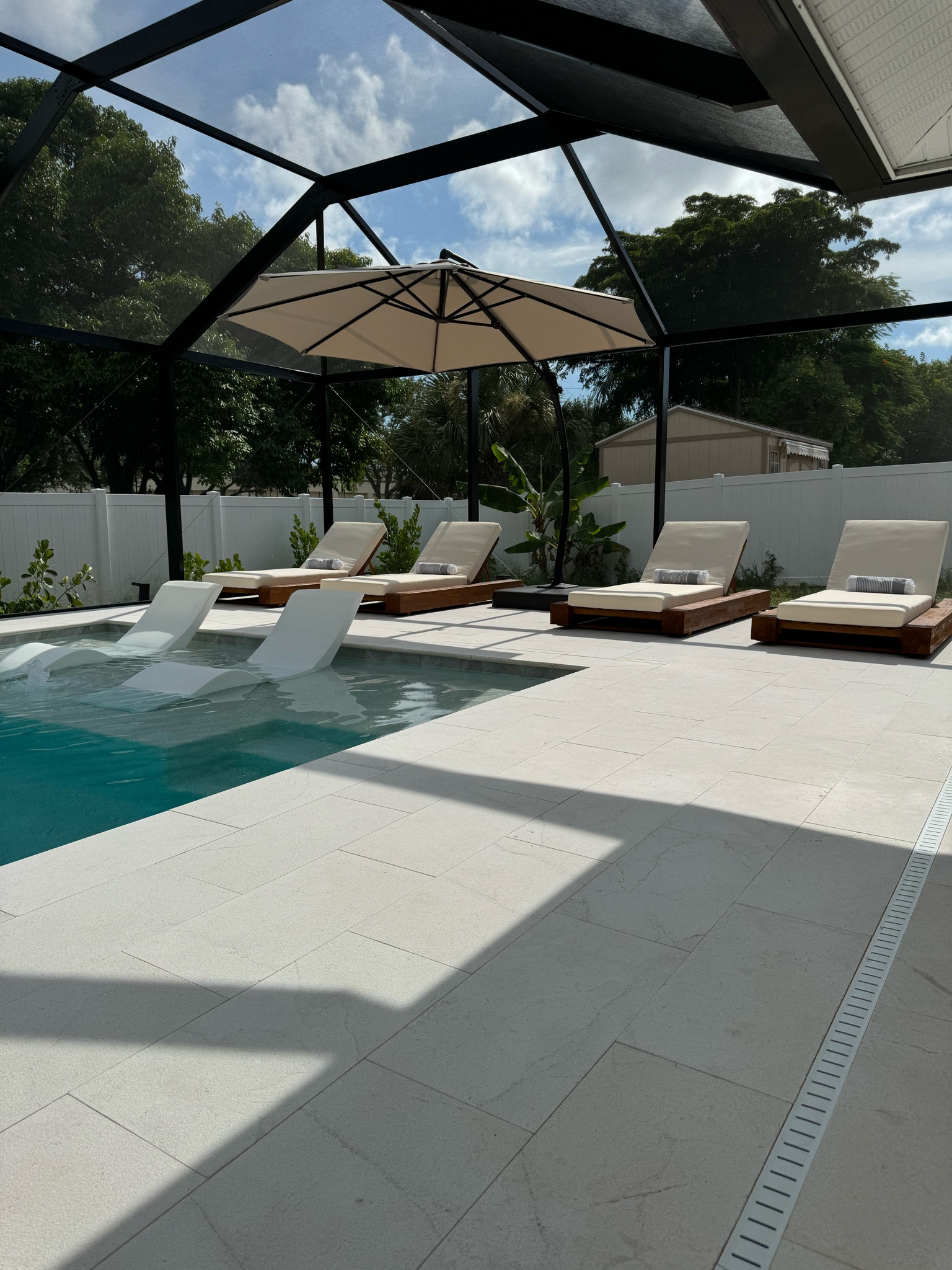 pool furniture as decor ✨
love the modern minimal and natural look of wooden furniture with a pool 😍 

#LTKStyleTip #LTKHome #LTKSaleAlert