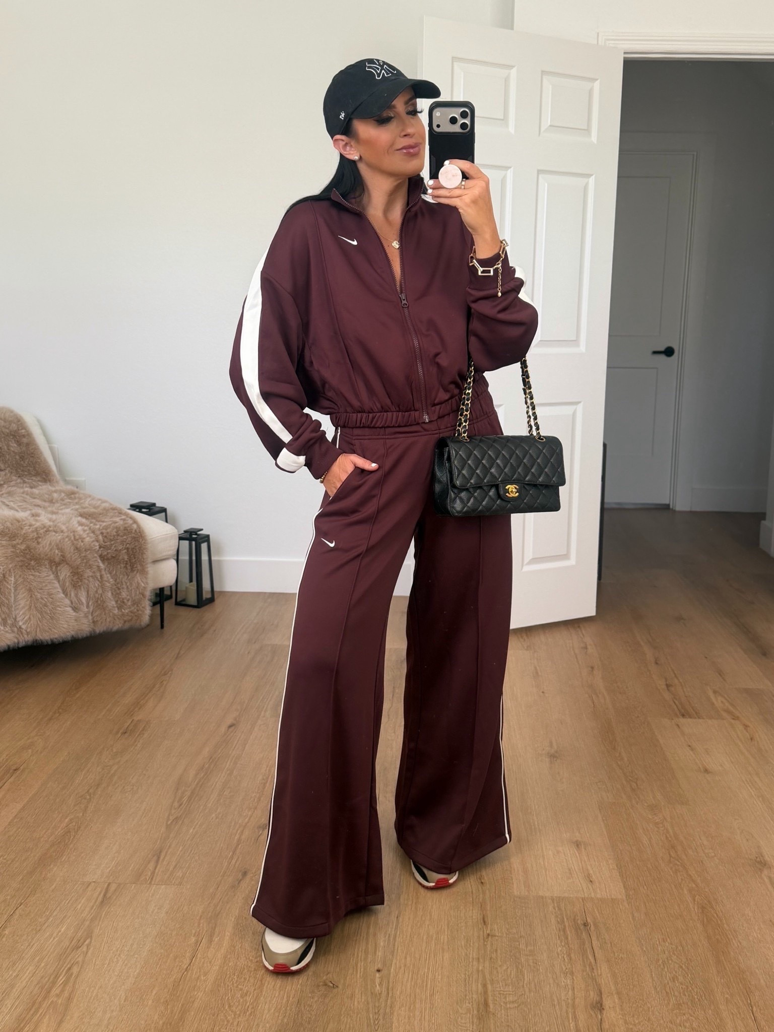 Nike Sportswear Women's Track Jacket wearing size small. Nike Sportswear Women's Mid-Rise Wide-Leg Track Pants wearing size small. 