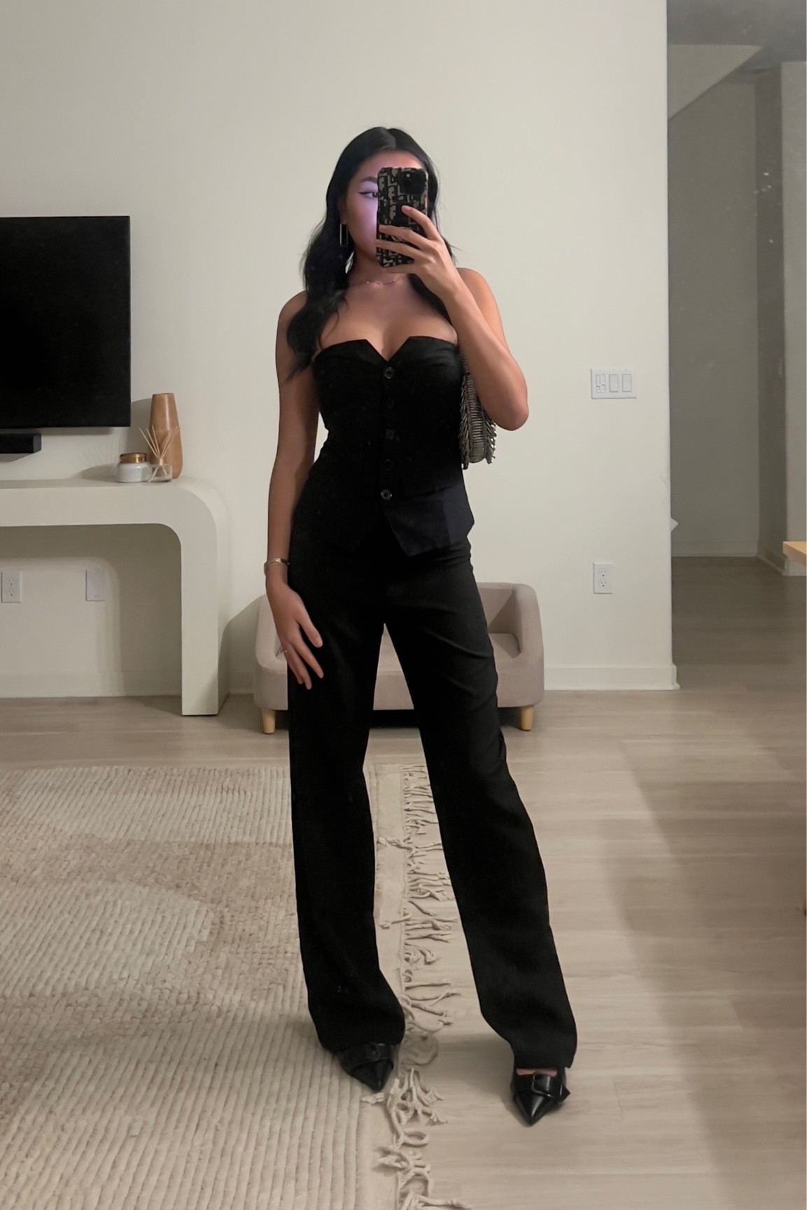 Classy all black outfit :) corset vest thingy + slacks and kitten heels 

#LTKstyletip #LTKfindsunder50 #LTKfindsunder100