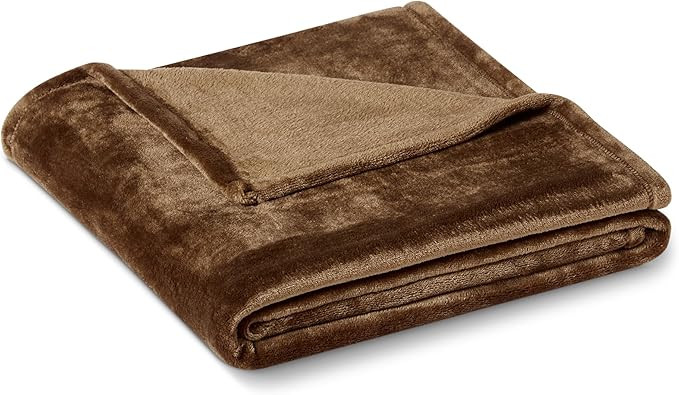 Amazon Basics Soft Fleece Throw Blanket, Lightweight Cozy Blanket for Couch & Sofa, 50 x 60 Inche... | Amazon (US)