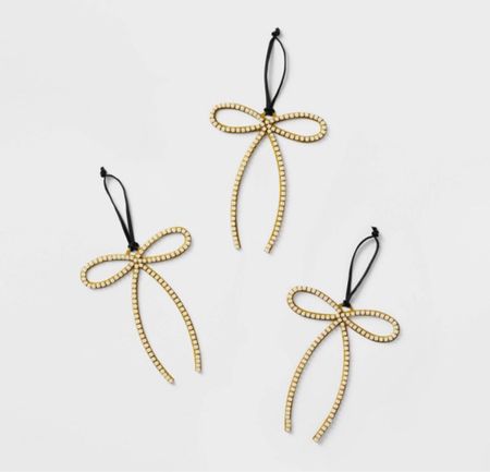 Gold Metal Bow ornaments with faux pearls 

#targetchristmas #bowknot #studiomcgee #threshold #ornaments #christmastree

#LTKhome #LTKHolidaySale #LTKHoliday