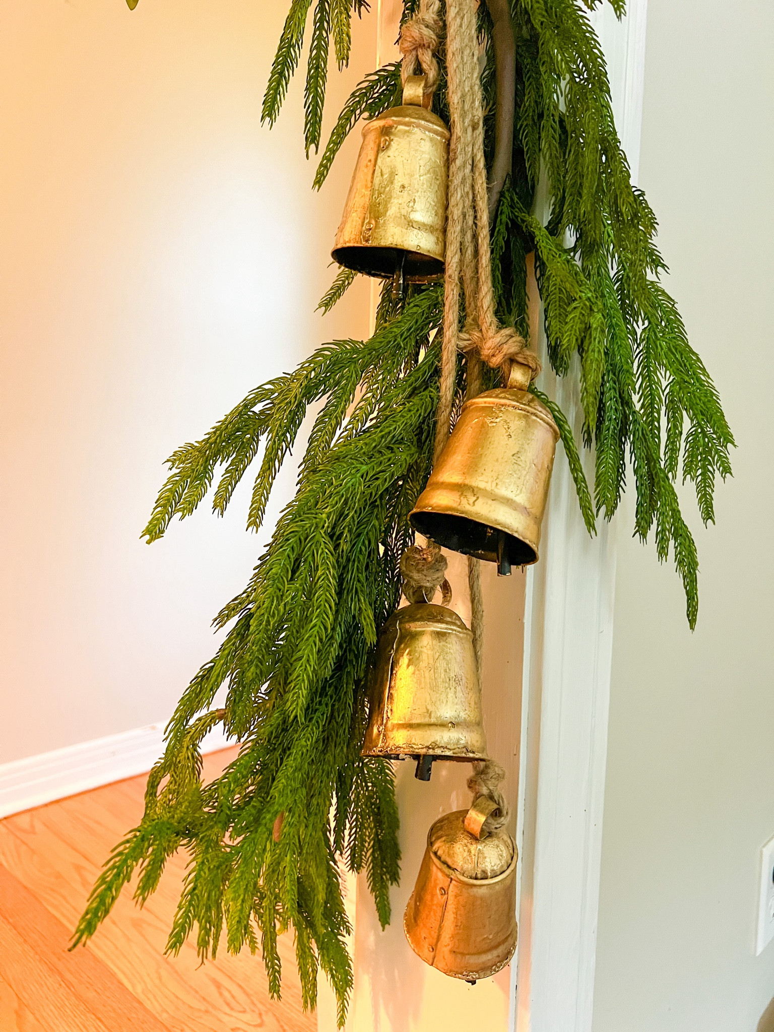 Looking to bring that classic holiday charm to your home? This ultra-realistic Norfolk garland and rustic gold bells combo adds the perfect touch of elegance and warmth to any space. Hang it along your mantel, staircase, or entryway for a cozy, timeless vibe. Tap to shop this beautiful garland and add a touch of vintage-inspired charm to your holiday decor! #LTKholiday #LTKhome

#LTKSeasonal #LTKHome #LTKHoliday