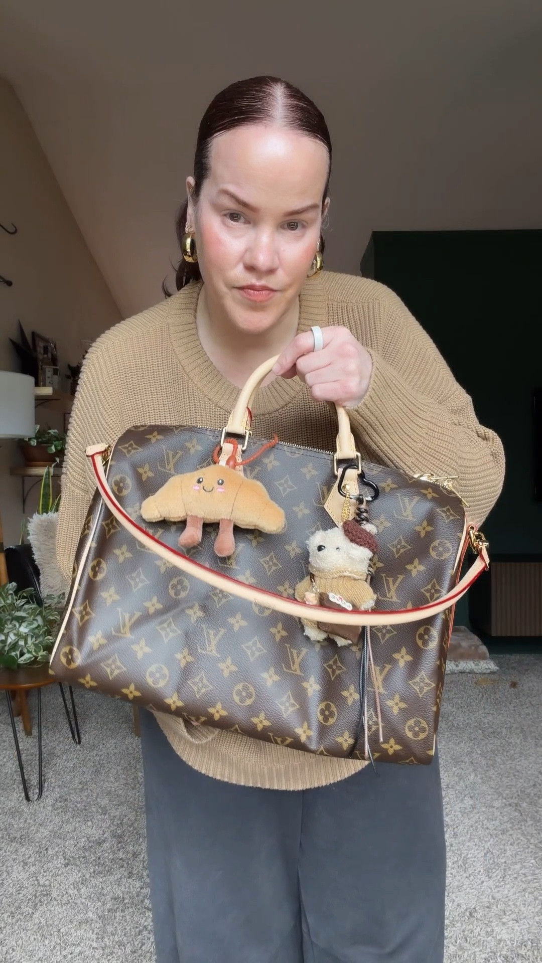 Affordable rolled leather strap and bag charms added to Speedy B 35