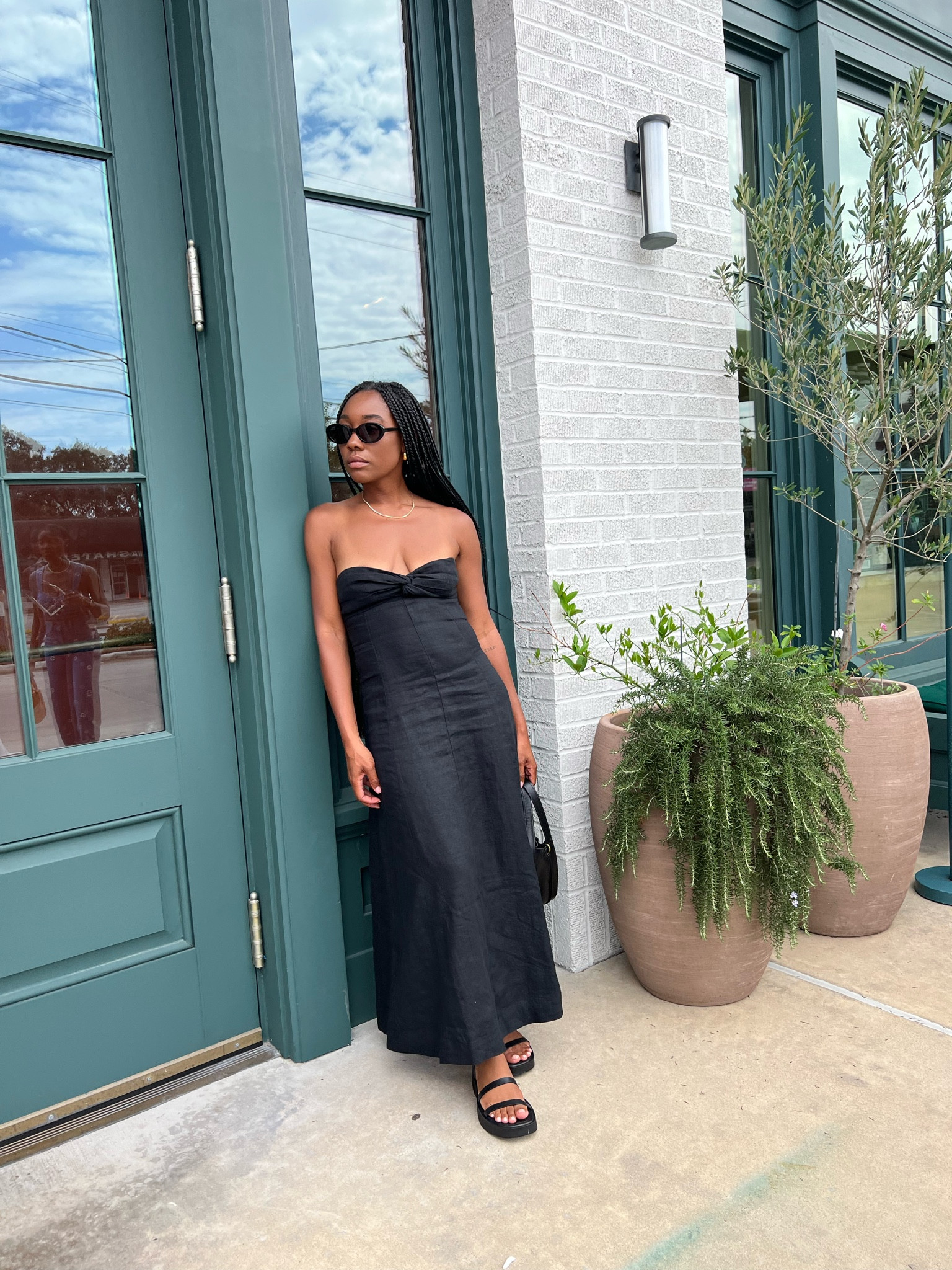 Black strapless maxi dress, black sandals, black oval sunglasses 

#LTKFind #LTKshoecrush #LTKstyletip