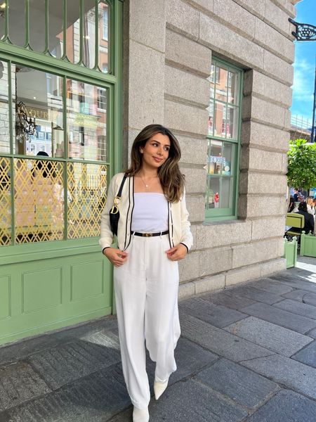 Mango White cardigan with black lining, lily silk white pleated trousers, bardot top, white point toe heels, black dior saddle bag, black belt

 Casual chic outfit, modest fashion 

#LTKstyletip #LTKeurope #LTKSeasonal