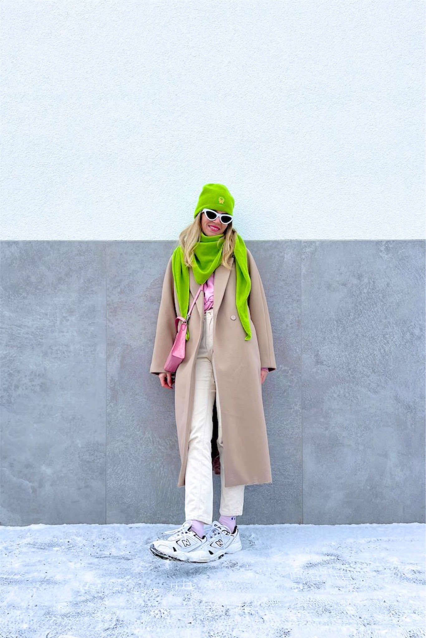 Neon Green Pink. Fashion and Style Blog Girl from Heartfelt Hunt. Girl with blonde hair wearing a neon green beanie, neon green scarf, white cat-eye sunglasses, camel coat, pink sweatshirt, pink Staud bag, corduroy pants and New Balance sneakers. #colorfuloutfit #colorfulstyle #colorfulfashion #colorfullooks #fashionfun #cutefalloutfit #fallfashion2022 #falllookbook #fitcheck #dailylooks #dailylookbook #contentcreator #microinfluencer #discoverunder20k
