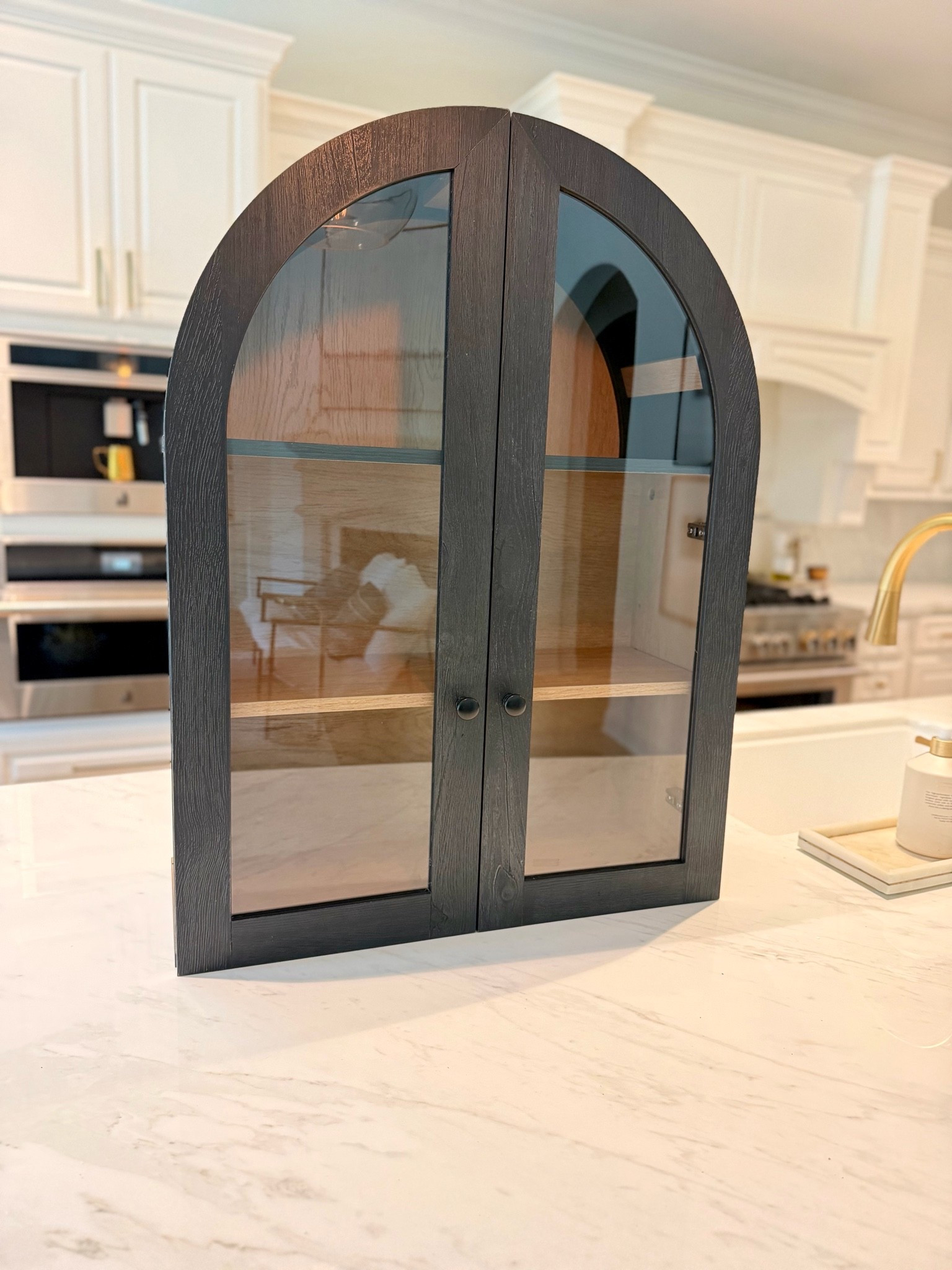 I put this arched cabinet together today and absolutely love it! It would be perfect for a restroom but I actually bought for our garage entry. Will share pics once it’s installed.

Cabinet
Arched cabinet
Storage cabinet

#LTKHome