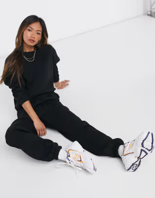 ASOS DESIGN tracksuit oversized sweat / oversized sweatpants in black | ASOS (Global)