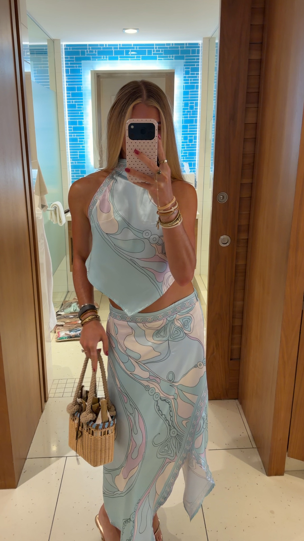 My outfit for the night in the Bahamas my matching skirt set is amazon! Amazon size small Wuitrie Two Piece Skirt Set for Women Summer Fashion Printed Satin Hanging Backless Top Irregular Midi Skirt Trendy Set. It’s a pucci look for less. My kitten heels are from Walmart. My bag is @Vivrelle    my code is SLOANEVOSEN.

#LTKootd #LTKdayinmylife #LTKTravel