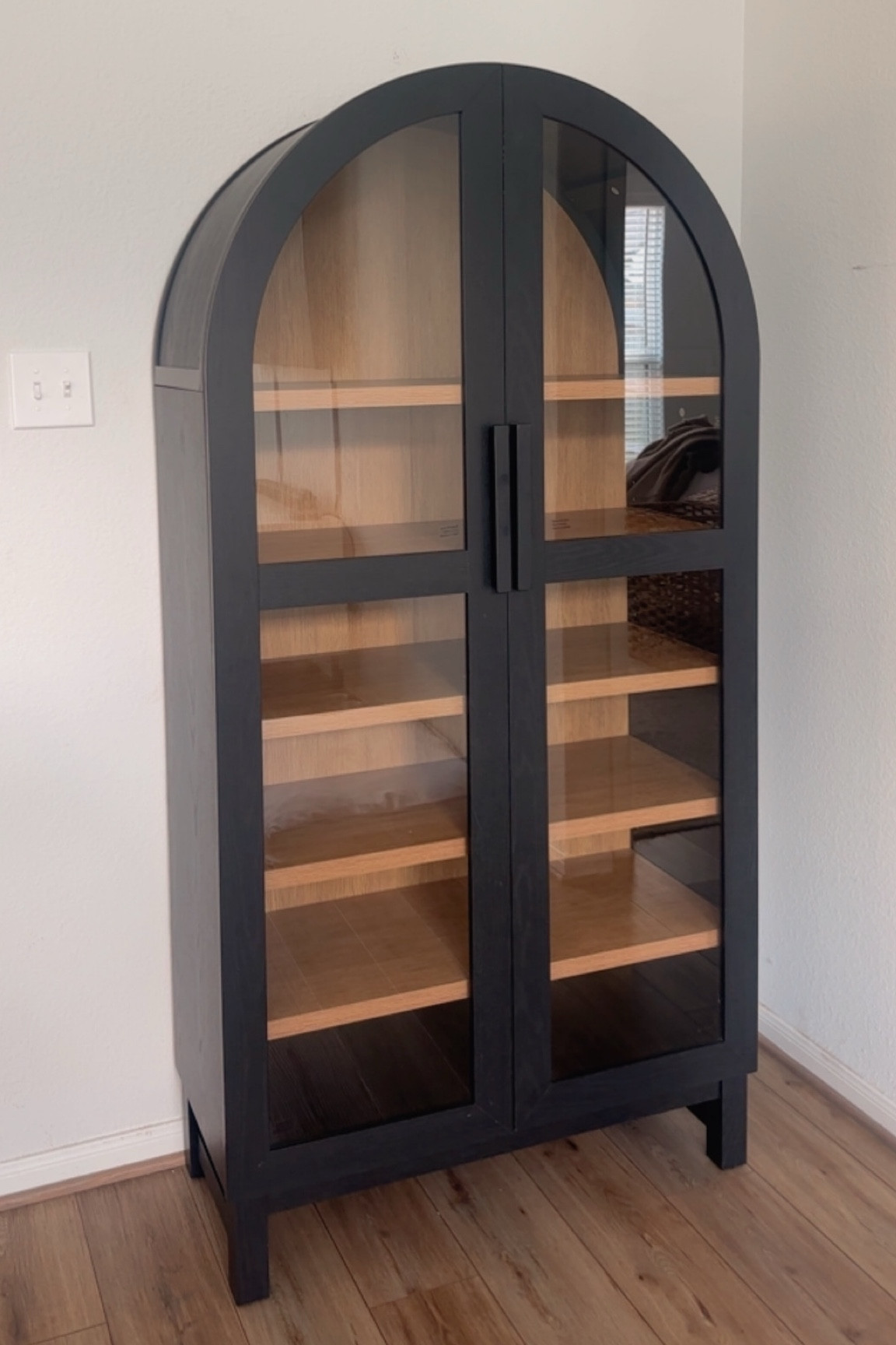 Obsessed with our new arched cabinet!

#LTKSaleAlert #LTKHome