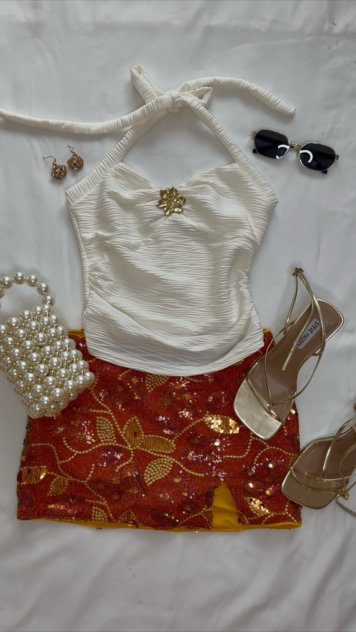 Amazon vacation outfit ✨ This mini sequin skirt and white top with gold hardware are giving effortless resort style. Perfect for a beach vacation, girls trip, cruise outfit, dinner by the water, or summer date night. If you’re looking for chic Amazon fashion finds, vacation outfits for women, resort wear, European summer outfits, or elevated summer style, this look is a favorite.

#amazonfashion #vacationoutfit #resortwear #summerstyle #beachvacationoutfit #europeansummer #amazonfinds #ltkfashion

#LTKTravel