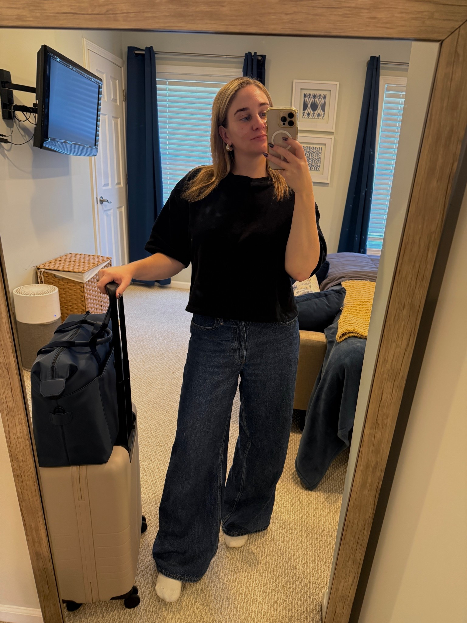 Travel outfit with monos luggage which I’ve really been loving. I have the taupe carry on and blue weekender duffle bag  

#LTKTravel #LTKItBag #LTKvlog