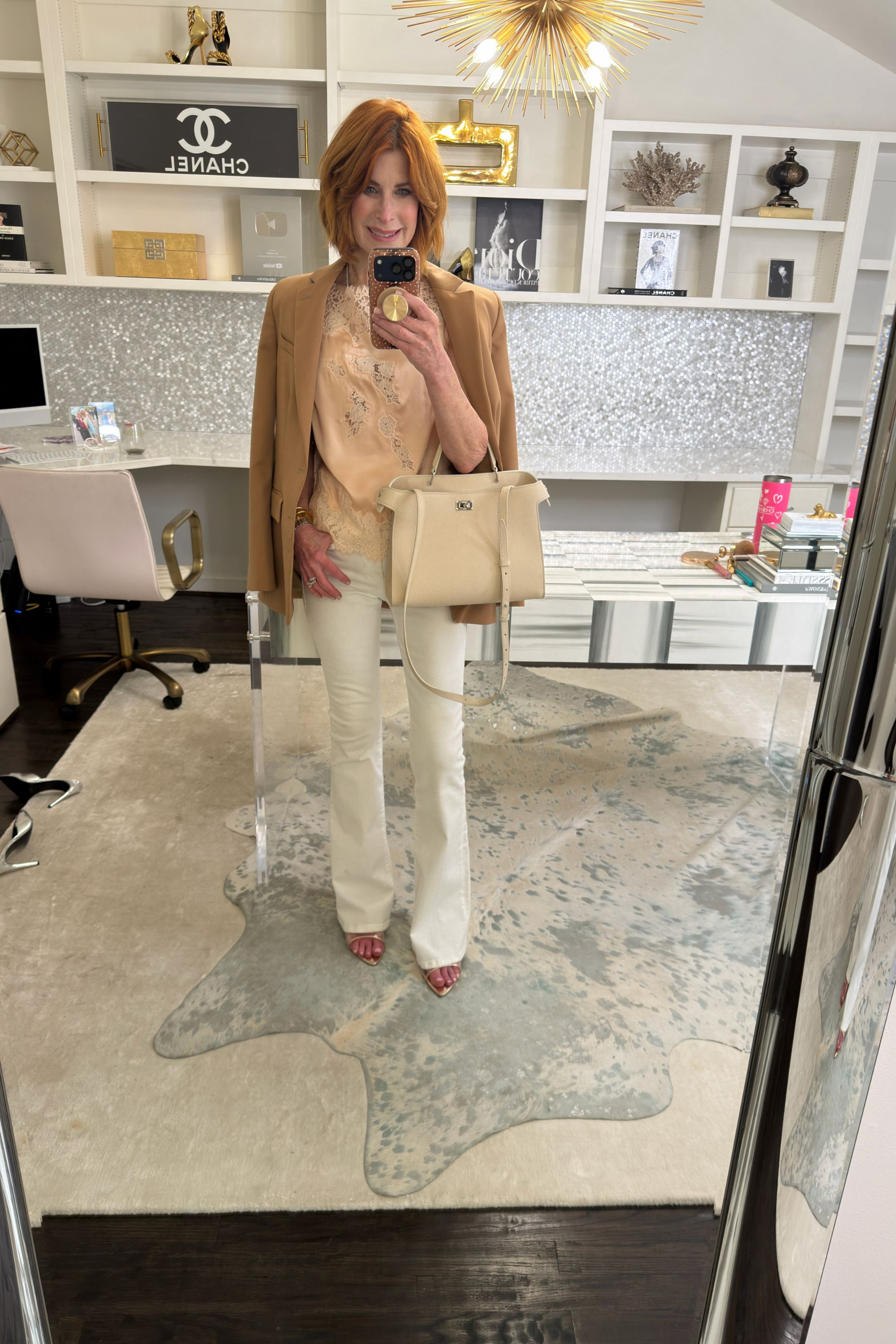 Neutral layers, lace trim silk, and white flare denim is one of my favorite elevated spring outfits 2026 combinations. This blazer instantly polishes the entire look and makes it perfect for date night outfits or chic work outfits. XS in blazer and top, 24 in jeans. 
 

 

#LTKootd #LTKOver40 #LTKPetite