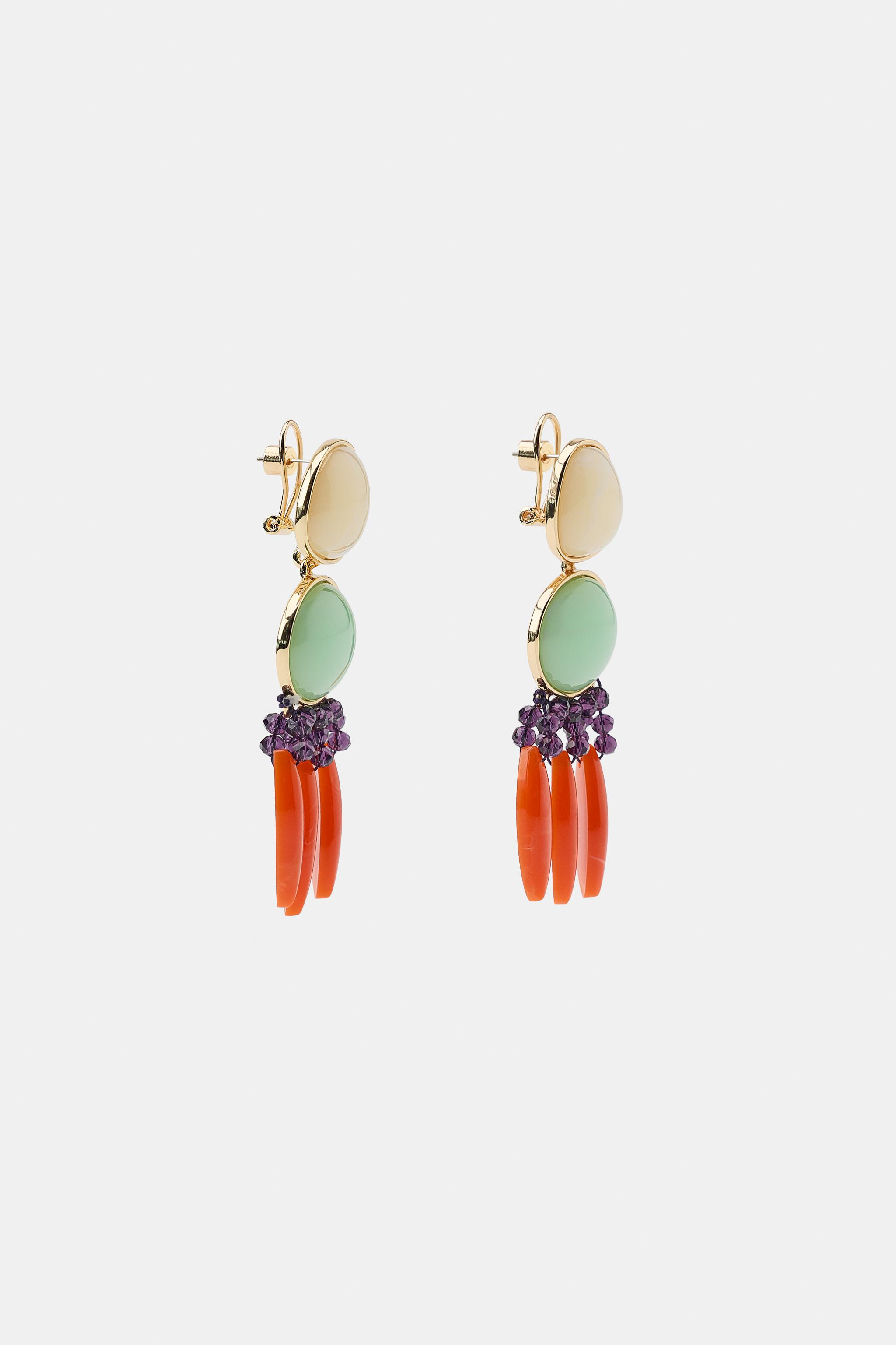 Double metal earrings with colorful resin pieces. Fringe-style beaded pendant in a contrasting co... | Zara US