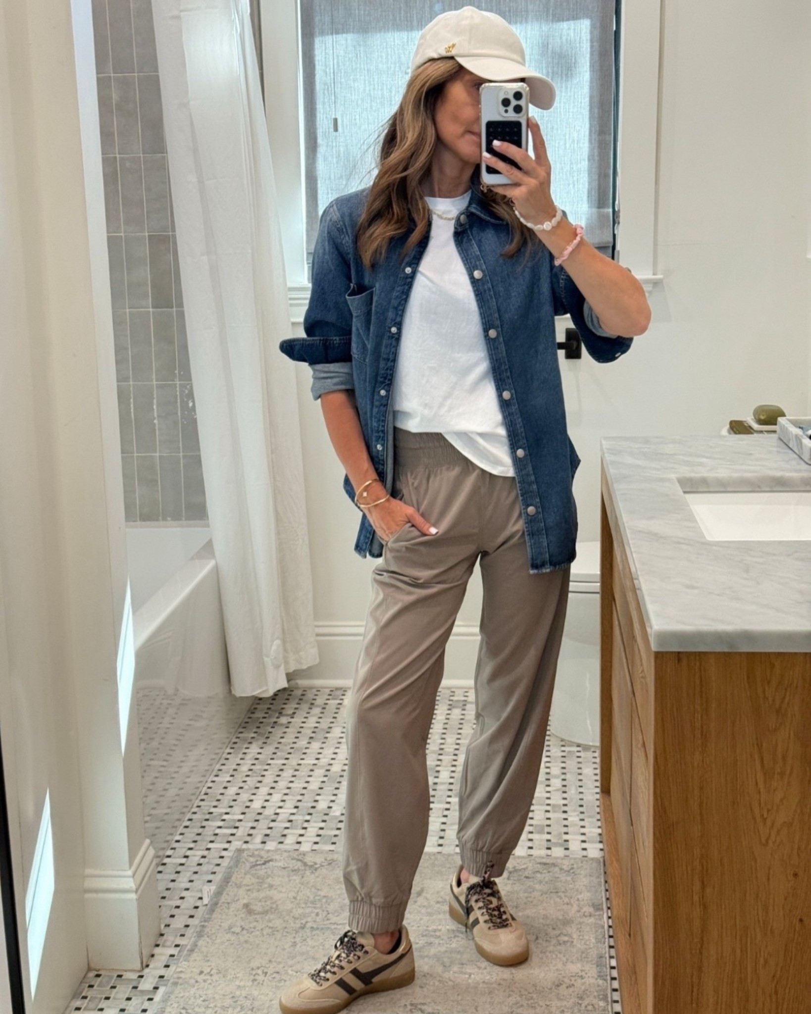 Casual everyday look also perfect for travel. 
-lightweight pants are comity a full elastic waistband. On sale now! I’m 5’6”
-green sneakers are fully stocked! TTS 
-suede bag is restocked
-denim shirt has soft, structured denim with snaps for buttons! I love it! 
-size up with the cable sweater, on sale. 
-white t-shirt is a favorite. 
-Negative lounge is a FAVORITE! Soft, crazy light weight and incredibly flattering. I like S in bottom and tops. 

#LTKSeasonal #LTKActive #LTKOver40