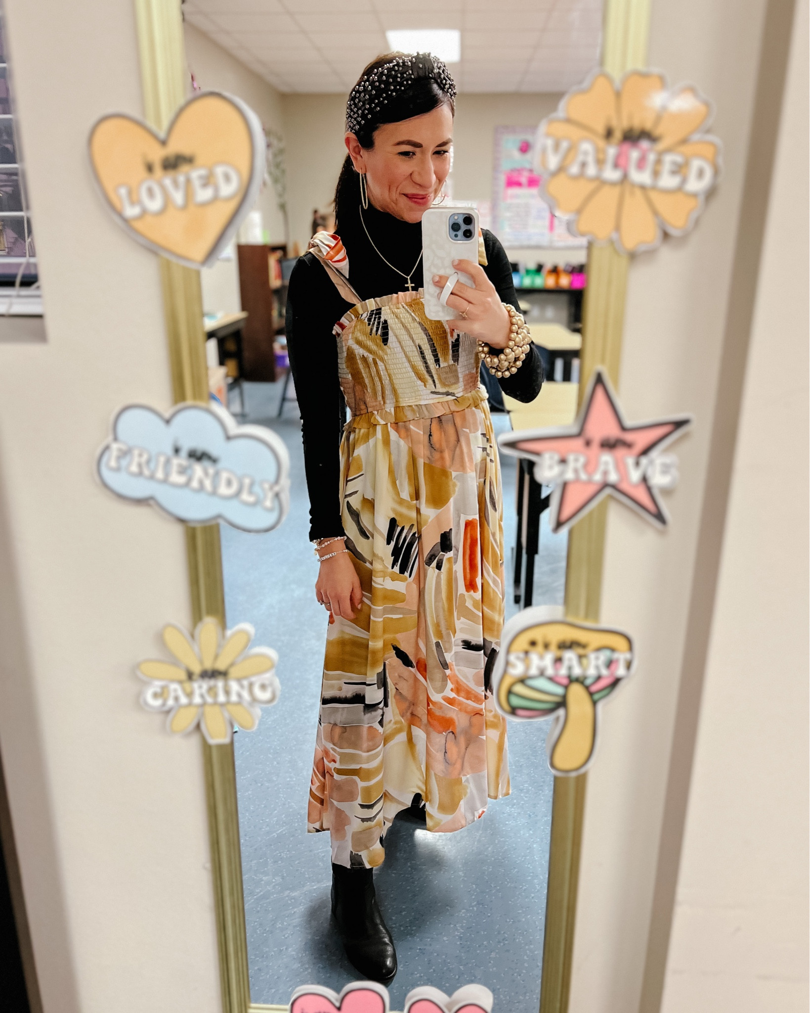 Transitional smocked maxi + black turtleneck + riding boots + black headband + gold bubble bracelet + hoop earrings = winter outfit