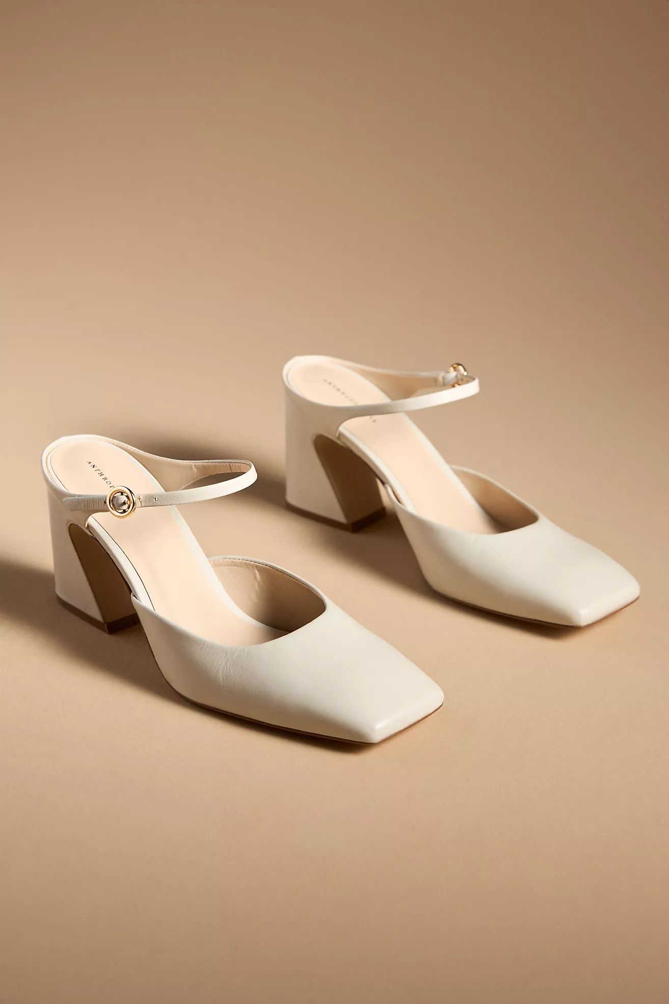 By Anthropologie Square-Toe Mule HeelsBy Anthropologie(6) Reviews$160.00Color: CREAMFitStandardSi... | Anthropologie (US)