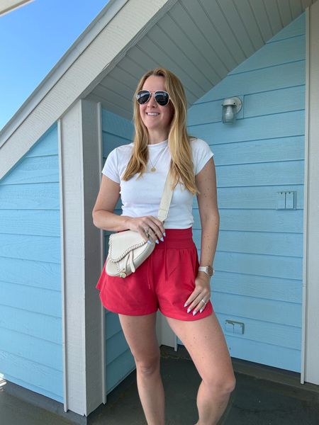 Memorial Day weekend comfy outfit of the day / summer athleisure look

Wearing my normal size in the red shorts and white tee

#LTKSeasonal #LTKFindsUnder50 #LTKActive
