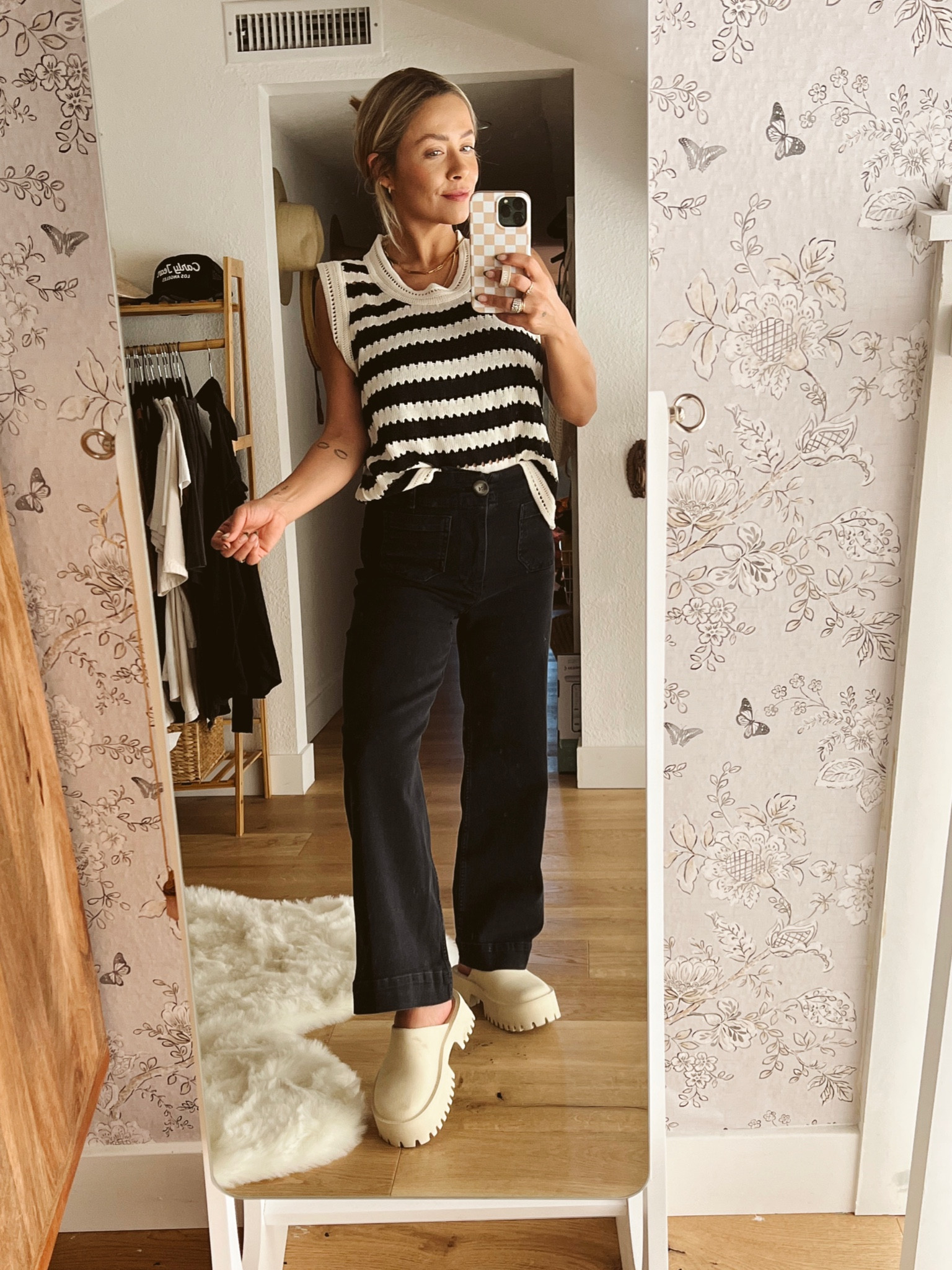 Use code: ASHLEY for 20% OFF at Carly Jean Los Angeles! OOTD Anthropologie denim, carly jean Los Angeles knit tank, Jeffrey Campbell platforms from Free People. 

#LTKshoecrush #LTKFind #LTKstyletip