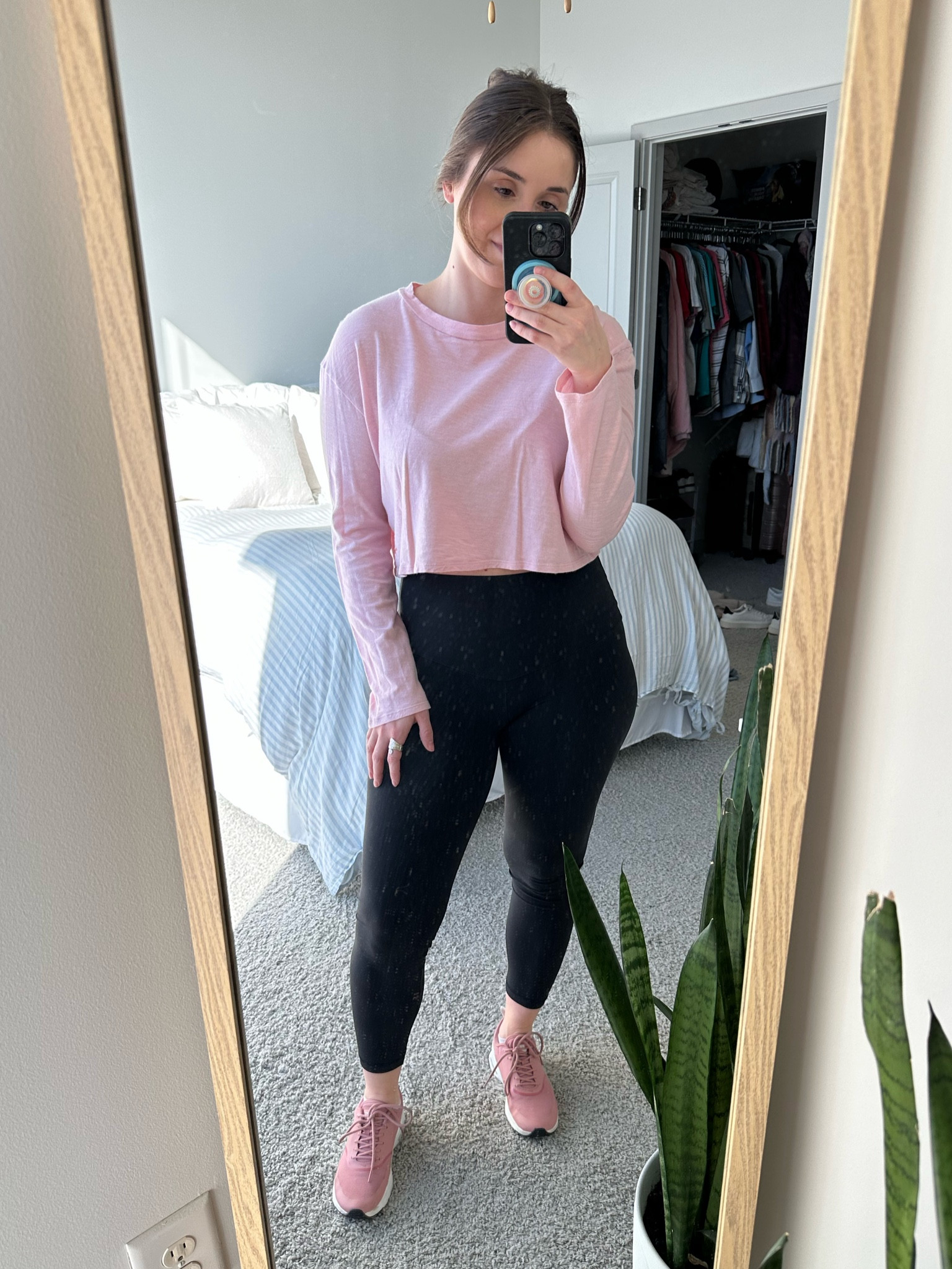 Going for a walk downtown in my Nikes and cropped workout top

#LTKstyletip