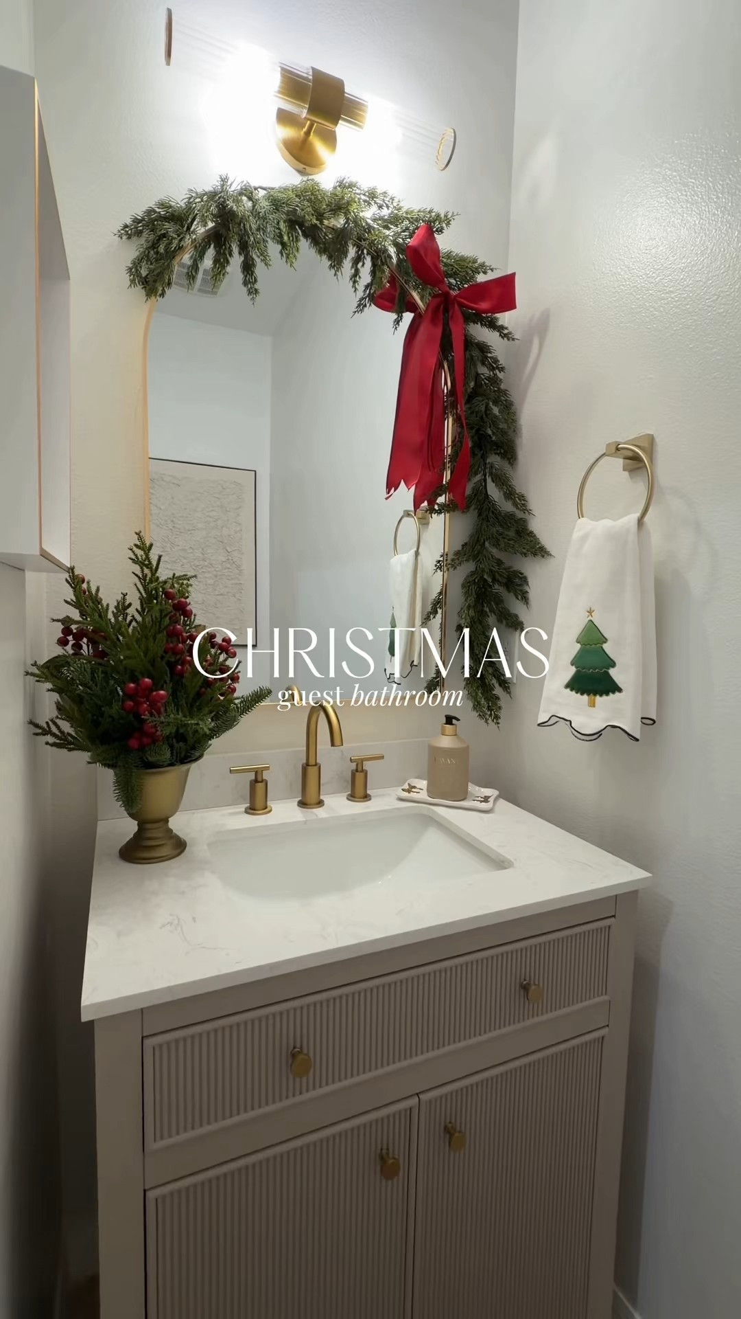 Christmas guest bathroom 🎄✨ I made this frame with wrapping paper! Obsessed with these products ❤️ 

#LTKSeasonal #LTKHome #LTKHoliday
